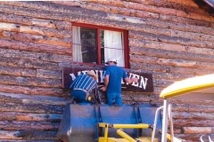 Gaylon-and-Grandson-Adam-hanging-sign